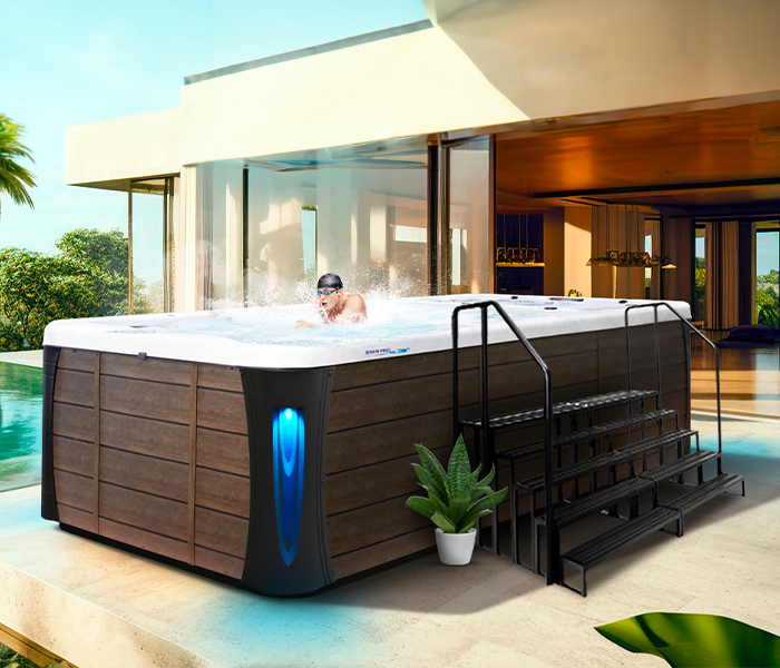 Calspas hot tub being used in a family setting - Rochester